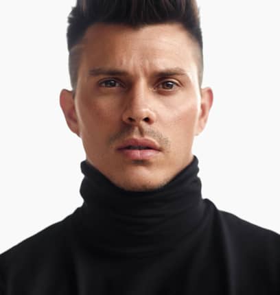Kenny Braasch modeling in a turtleneck